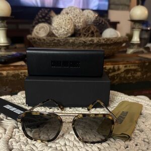 Cutler and Gross Tortoise Shell Sunglasses